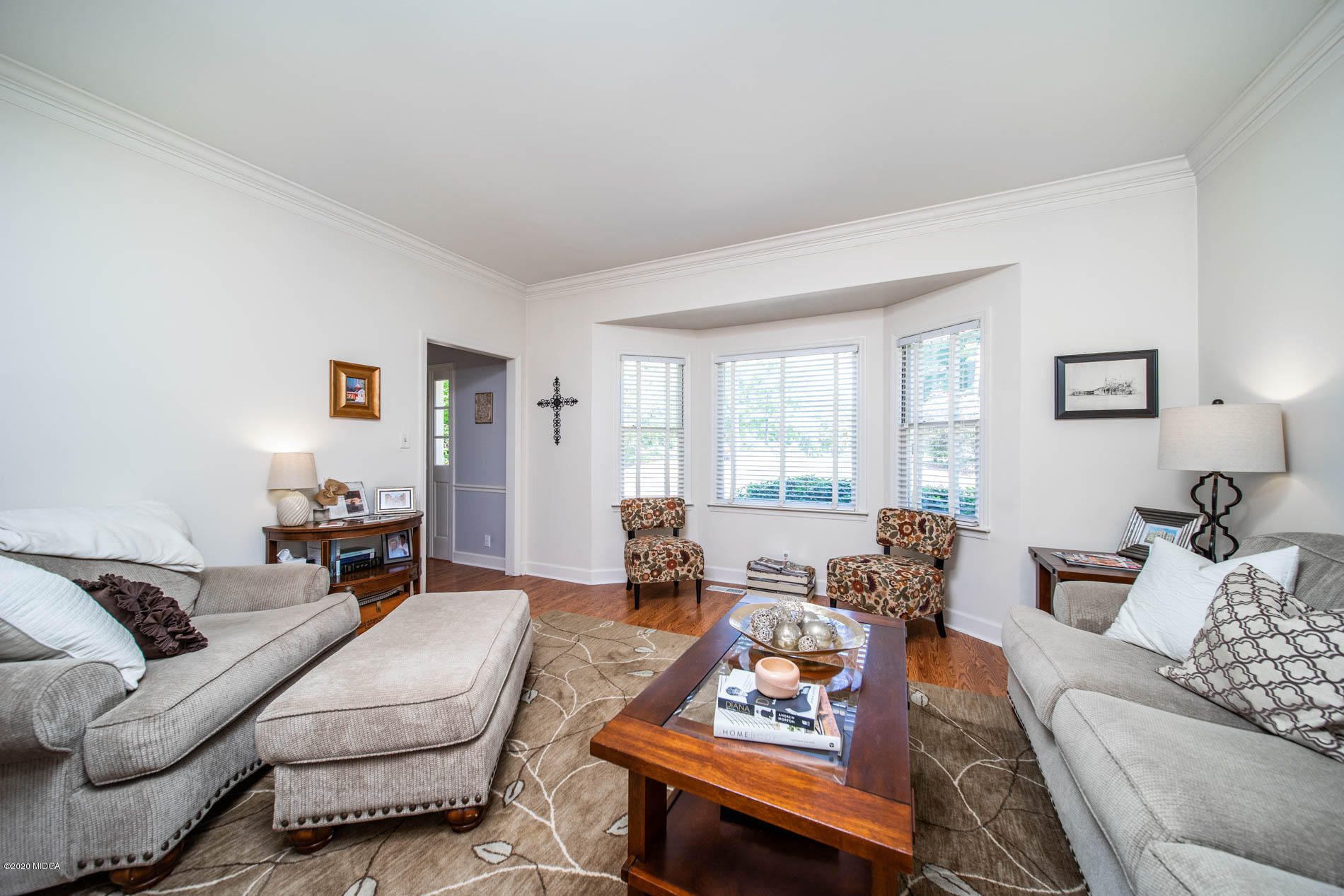 245 Beacon Hill Road Macon, GA 31210 - Photo 17 of 39 a living room with furniture and a large window