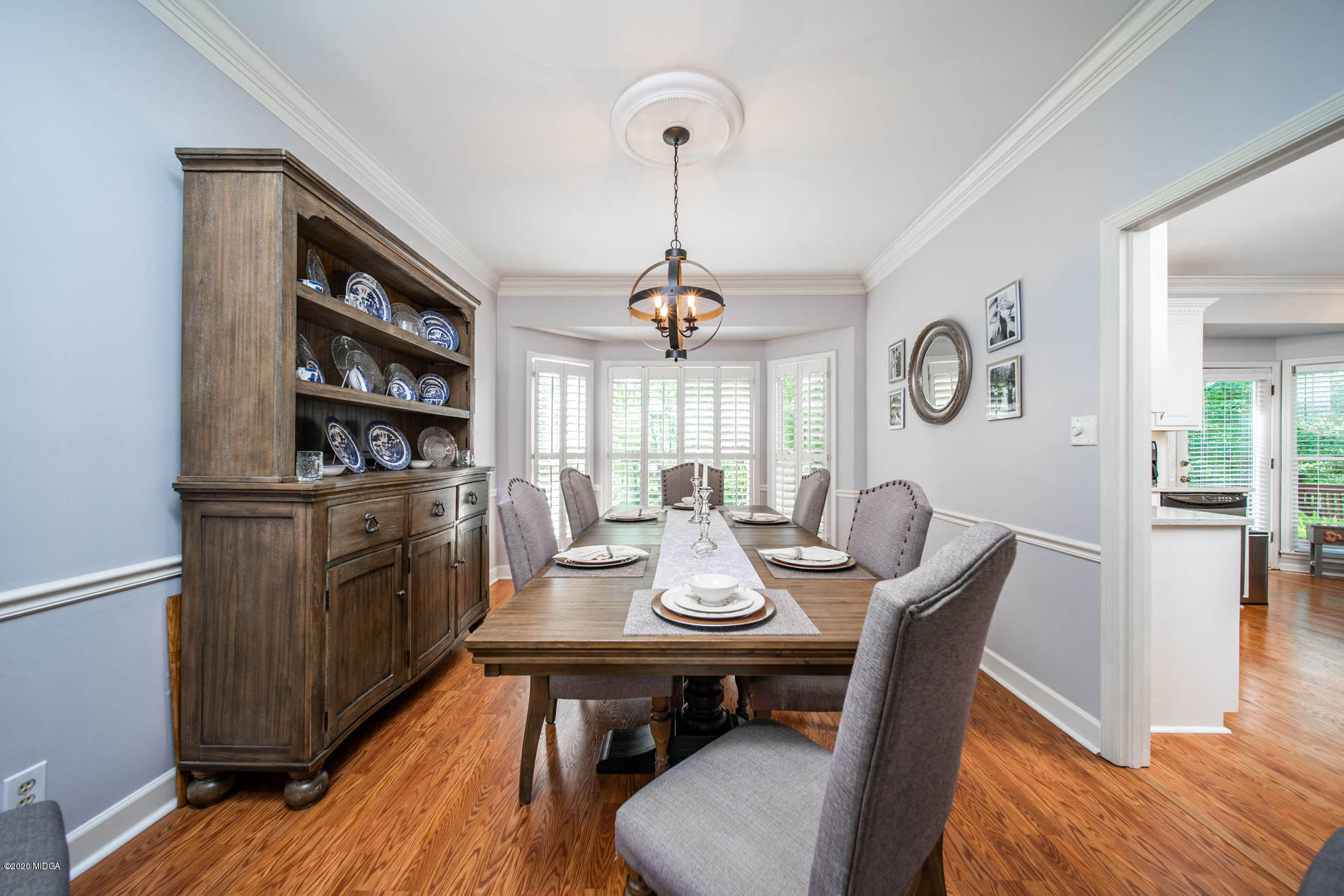 245 Beacon Hill Road Macon, GA 31210 - Photo 19 of 39 a view of a dining room with furniture window and wooden floor