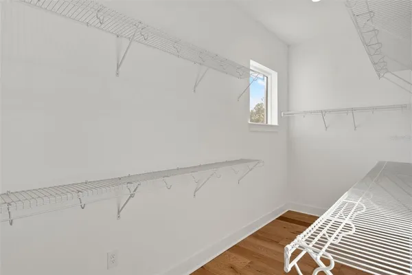 a view of a room with racks on the wall