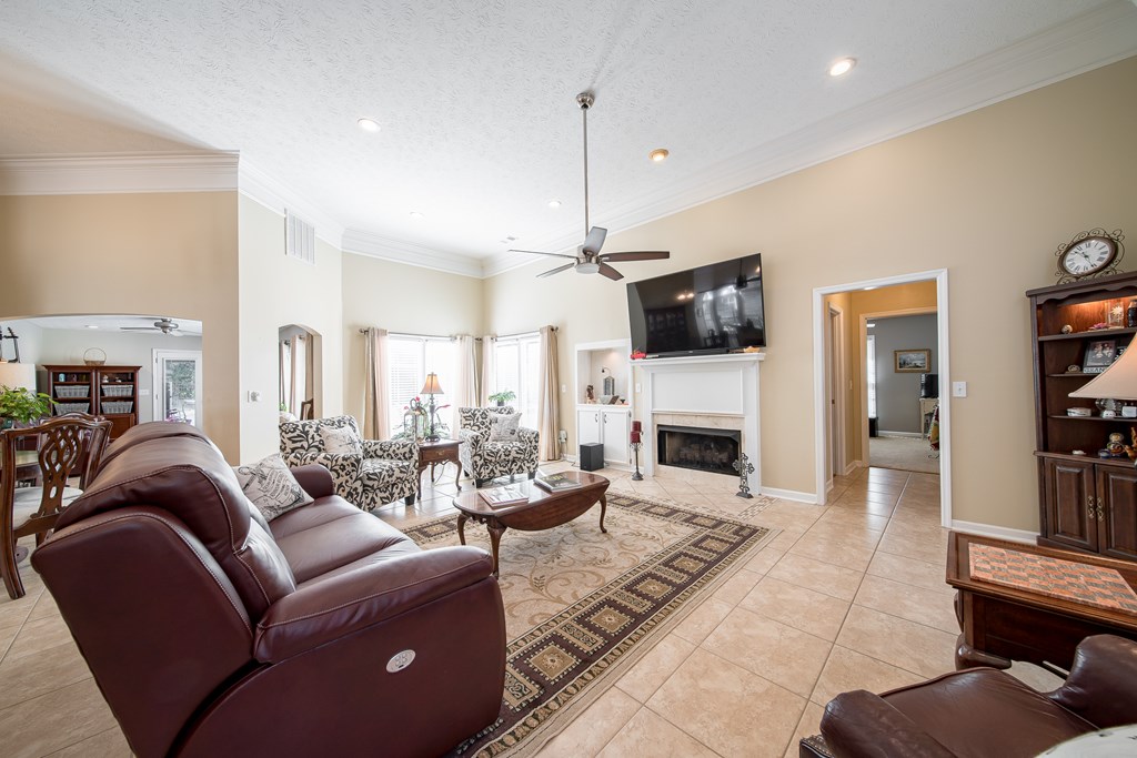 64 North Buckeye Loop Midland, GA 31820 - Photo 13 of 51 a living room with furniture fireplace and flat screen tv