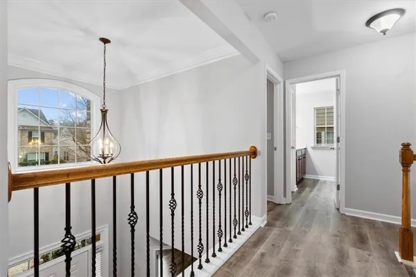 a view of a hallway with a window
