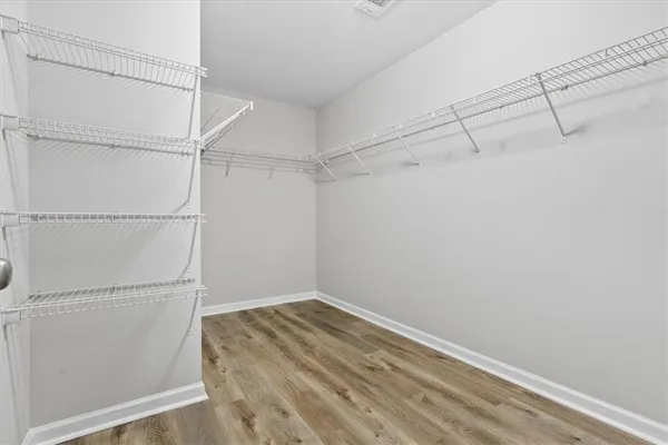 a view of a room with racks on the wall