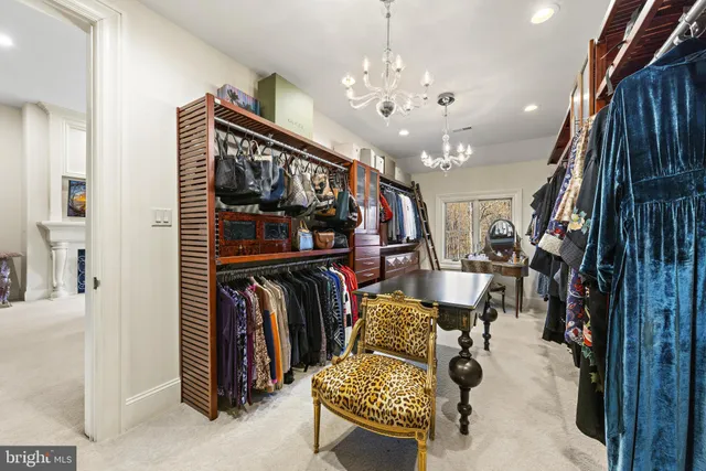 a view of a dining room with furniture wooden floor and chandelier