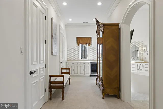 a living room with furniture a flat screen tv and a window