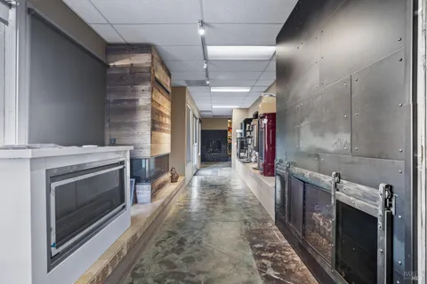 a hallway with cabinets