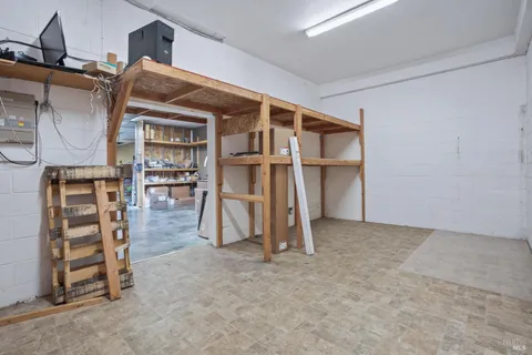 a view of a kitchen with a sink and a window