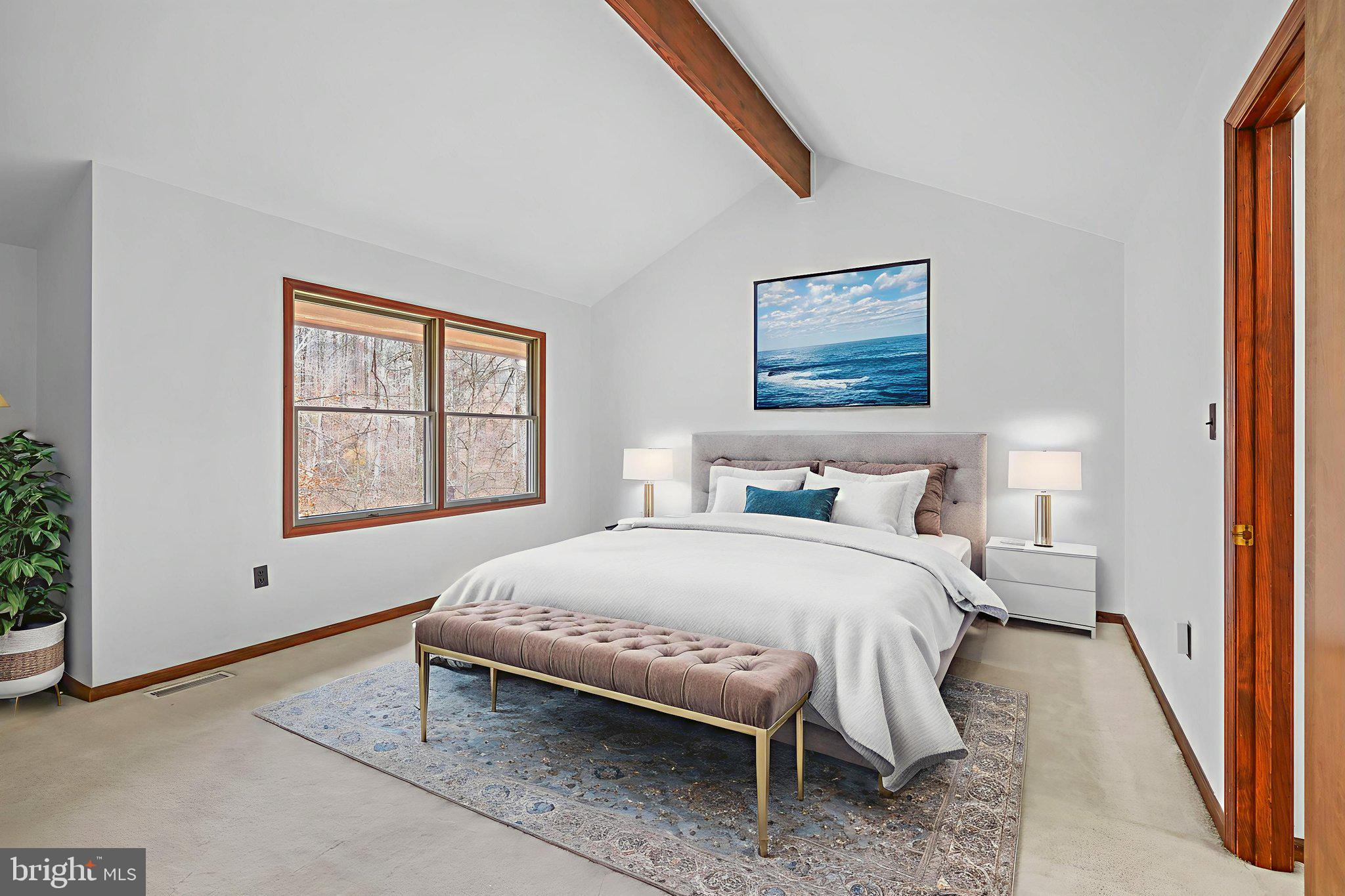 520 Chesapeake Beach Road Owings, MD 20736 - Photo 31 of 70 a bedroom with a bed and window