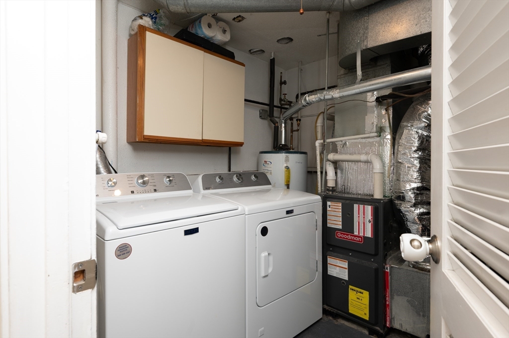 25 Shea Street, Unit 8 Dracut, MA 01826 - Photo 21 of 37 a utility room with dryer and washer