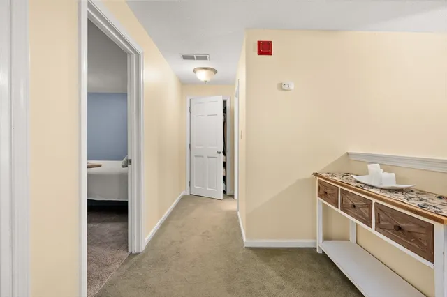 a view of a kitchen cabinets and a stove