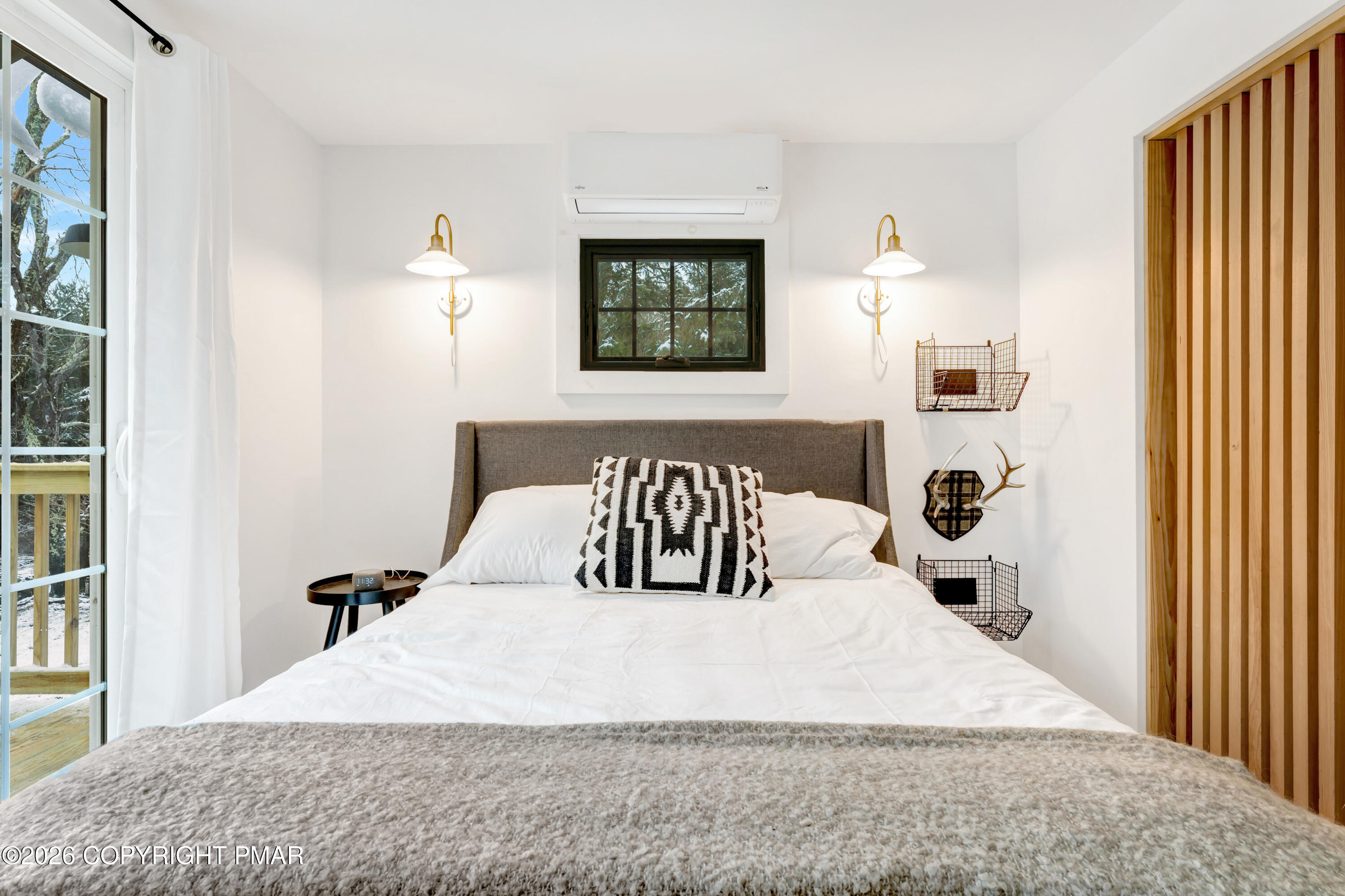 353 German Hill Road Shohola, PA 18458 - Photo 24 of 35 a large white bed in a white room