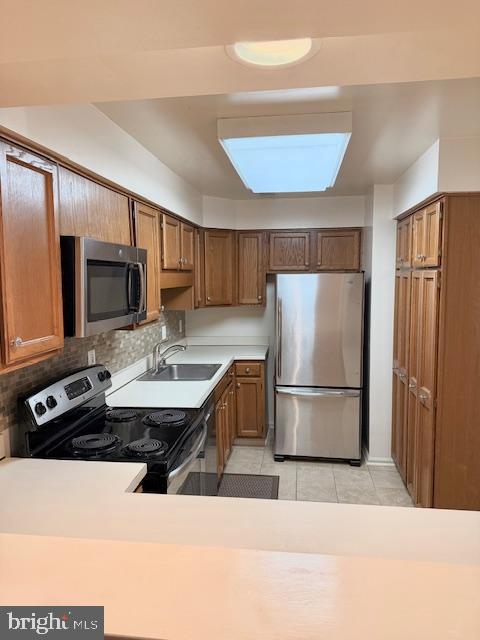 10714 Kings Riding Way, Unit 10121 Rockville, MD 20852 - Photo 8 of 24 Stainless steel appliances highlight the kitchen