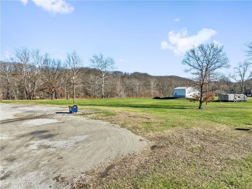429 River Road Perryopolis, PA 15473 - Photo 12 of 14 a view of a field with trees
