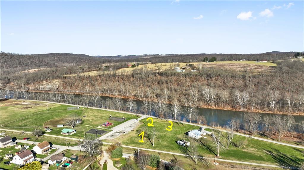 429 River Road Perryopolis, PA 15473 - Photo 2 of 14 a view of a lake with a mountain view
