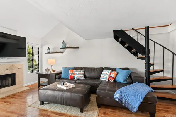 a bedroom with a bed and dresser