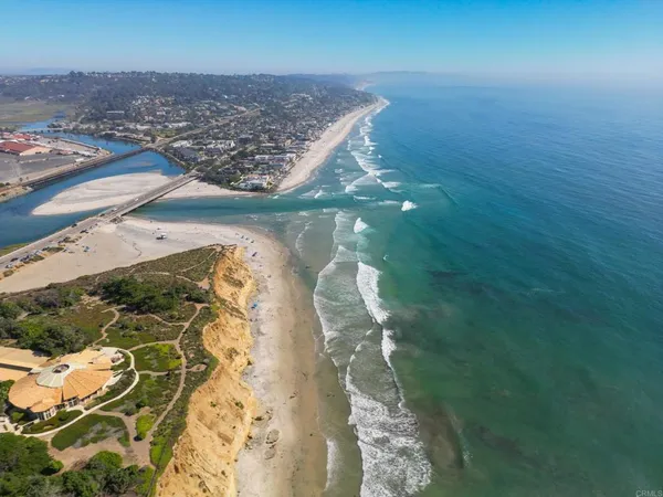 a view of building with a garden