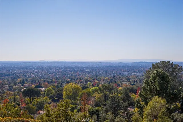 an aerial view of residential house and green space