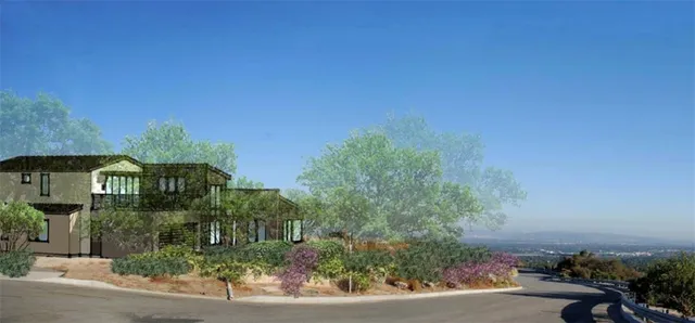 view of a street with a building in the background