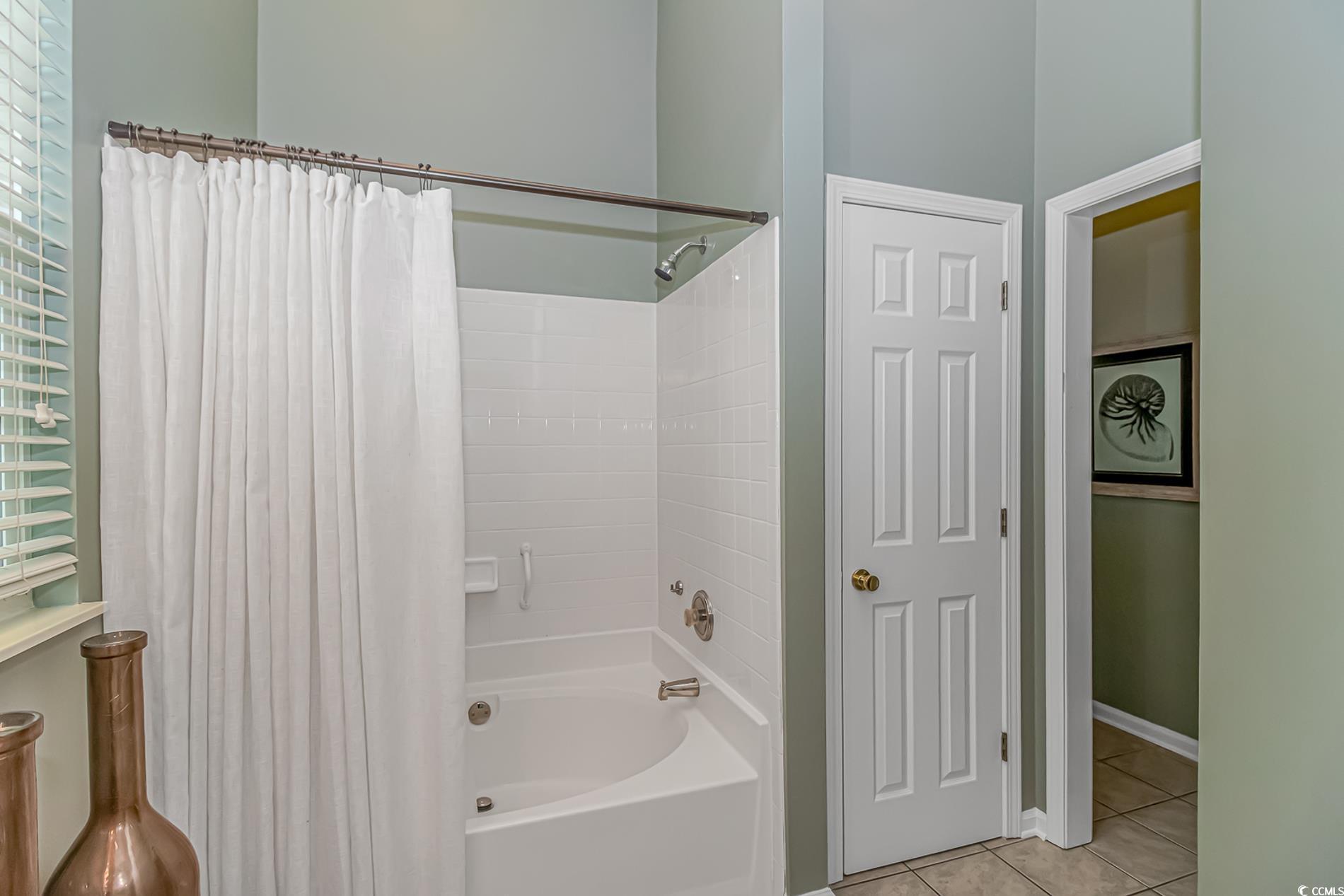 1474 Riceland Court Murrells Inlet, SC 29576 - Photo 16 of 30 Bathroom featuring shower / bath combo with shower