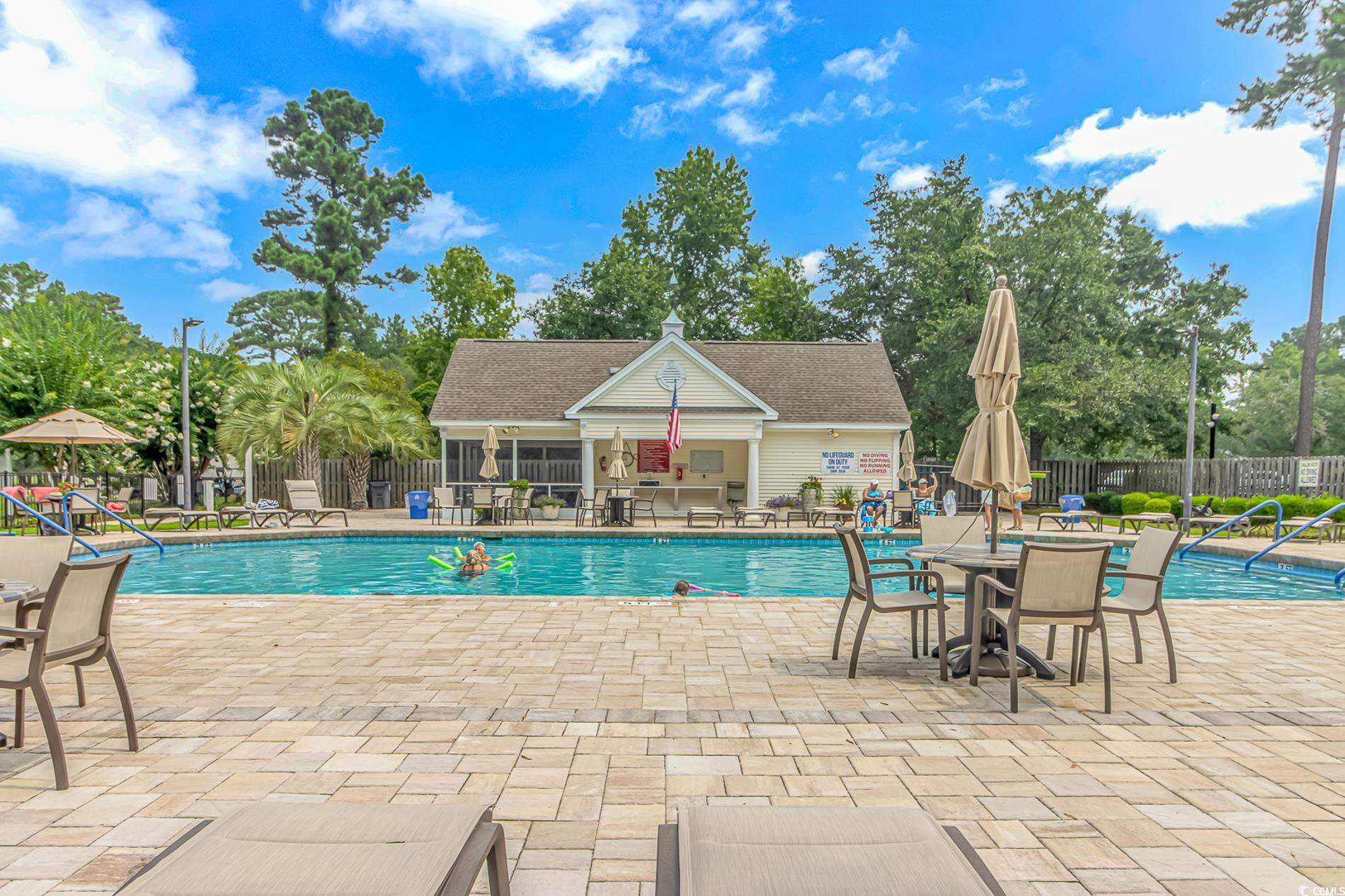 1474 Riceland Court Murrells Inlet, SC 29576 - Photo 29 of 30 View of swimming pool featuring a patio