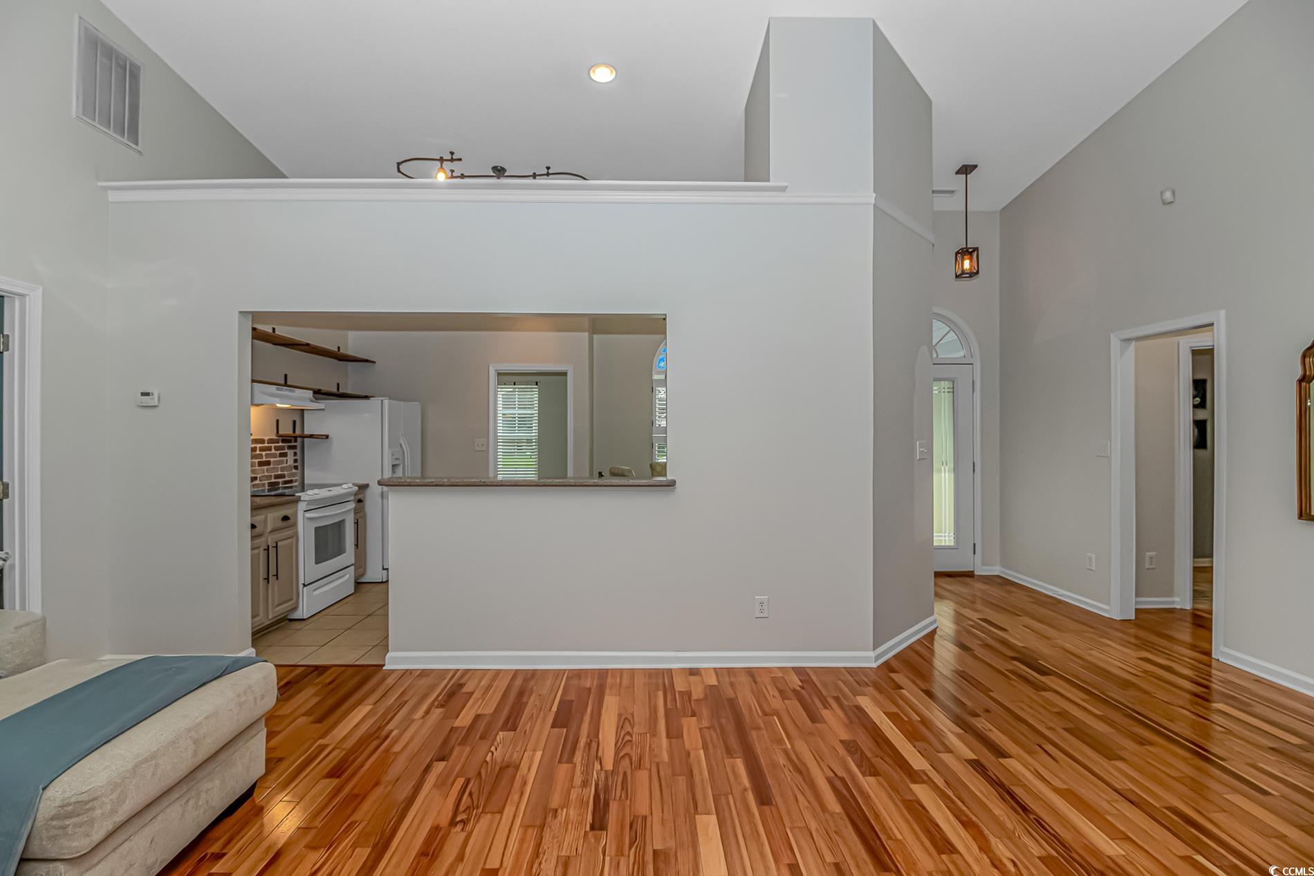 1474 Riceland Court Murrells Inlet, SC 29576 - Photo 9 of 30 Living room featuring light wood-type flooring, a