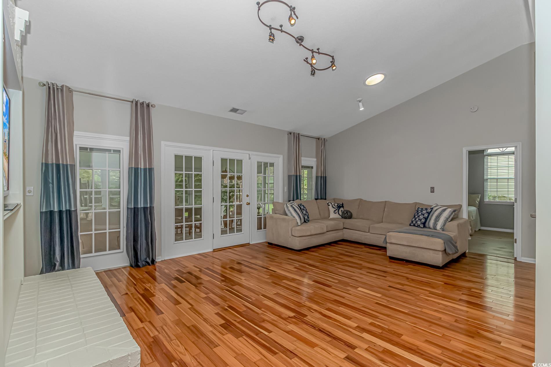 1474 Riceland Court Murrells Inlet, SC 29576 - Photo 10 of 30 Unfurnished living room with light hardwood / wood