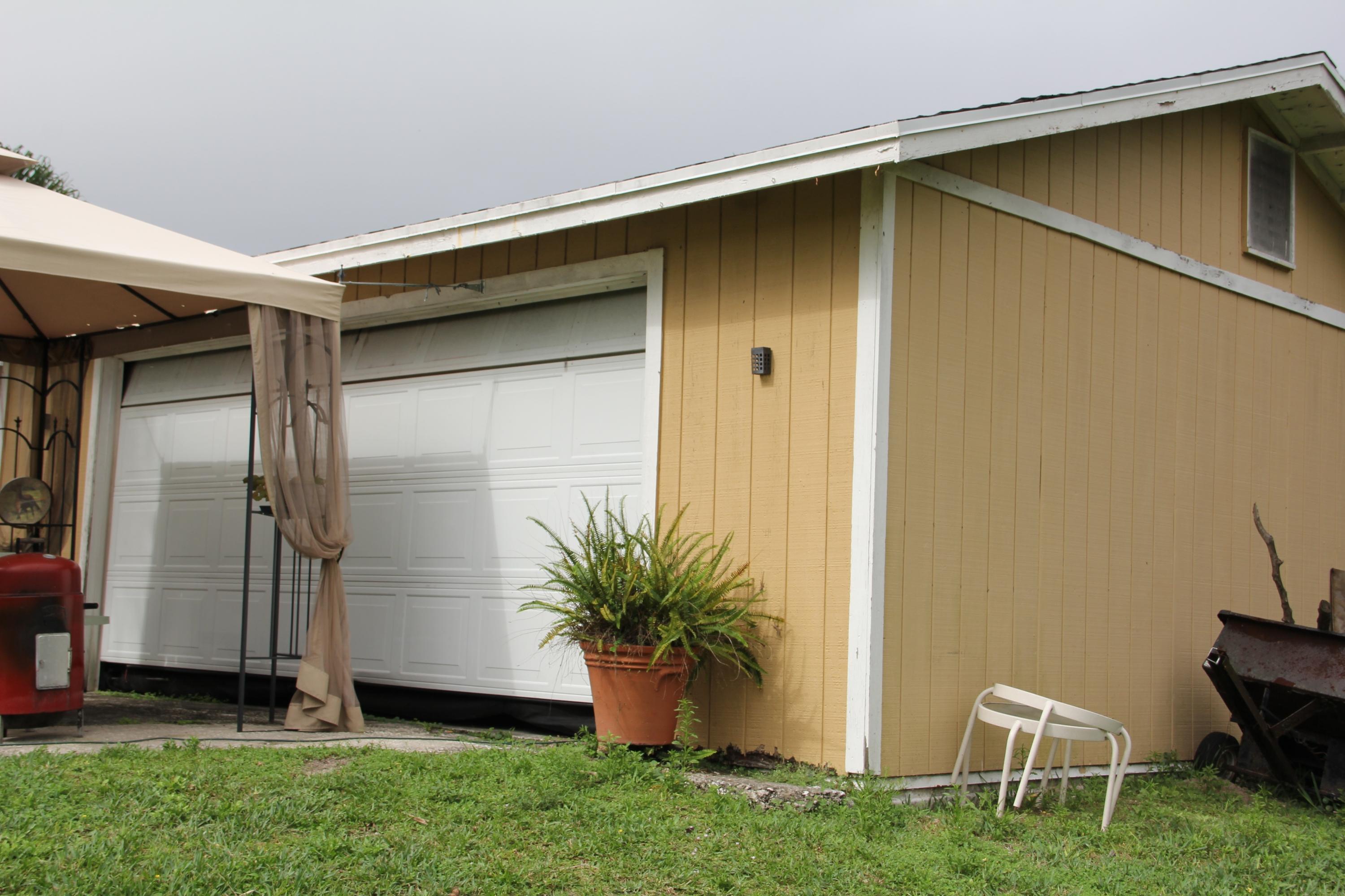 9141 154th Road North Jupiter, FL 33478 - Photo 4 of 61 Separate 2 car Garage