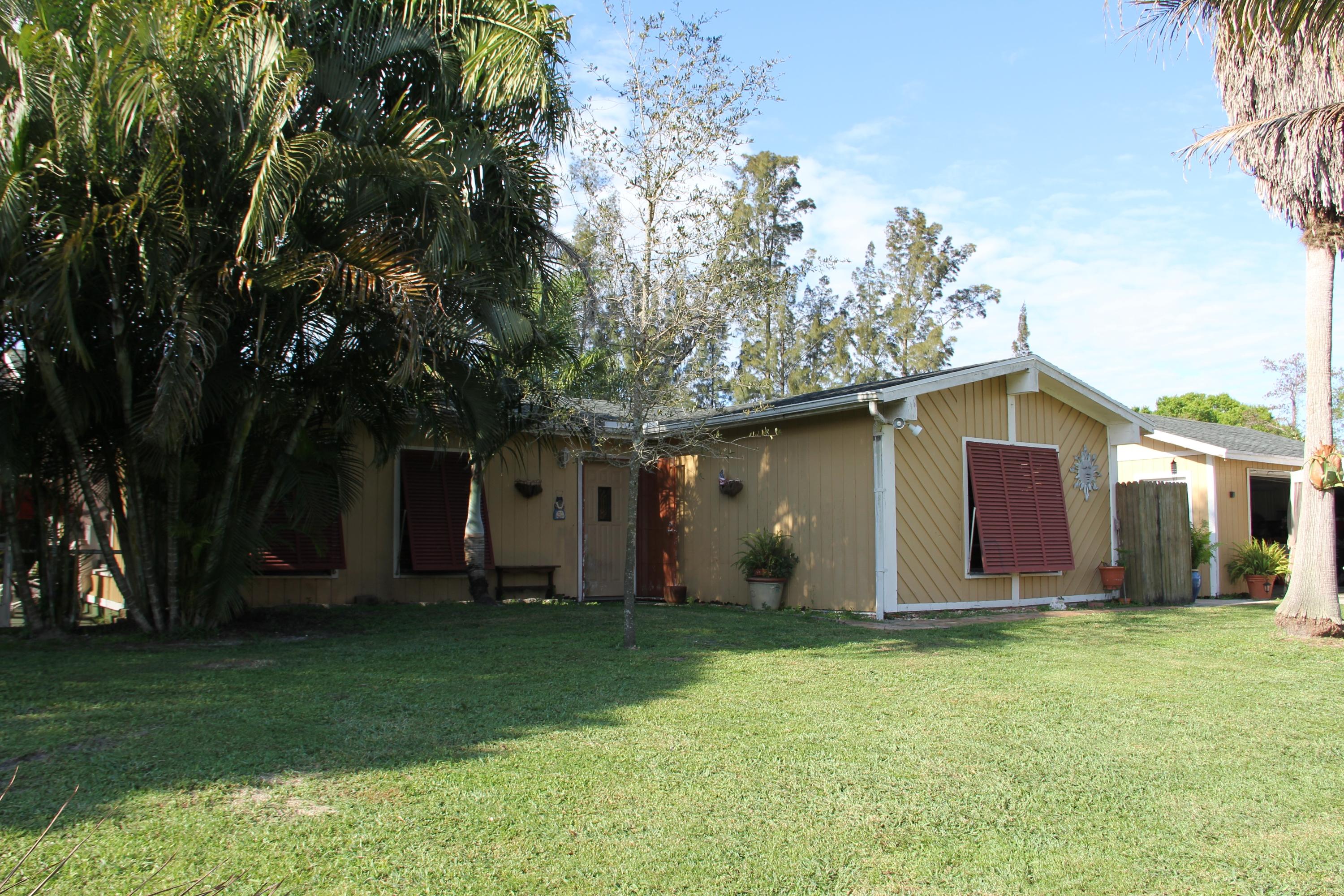 9141 154th Road North Jupiter, FL 33478 - Photo 42 of 61 Front Yard