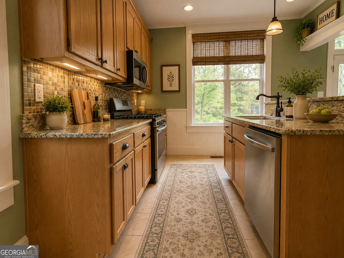 316 West Church Street Fort Valley, GA 31030 - Photo 16 of 28 a kitchen with stainless steel appliances granite countertop a stove a sink and a microwave