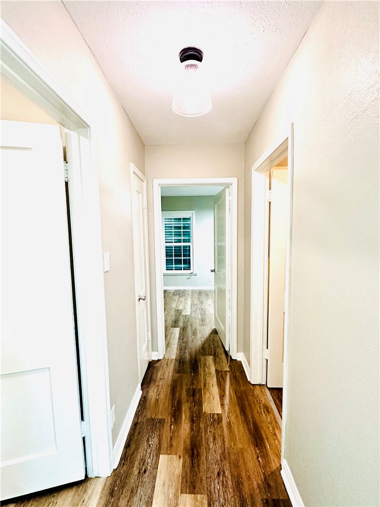 1202 Devon Drive Corpus Christi, TX 78404 - Photo 2 of 19 a bed room with a bed and a window