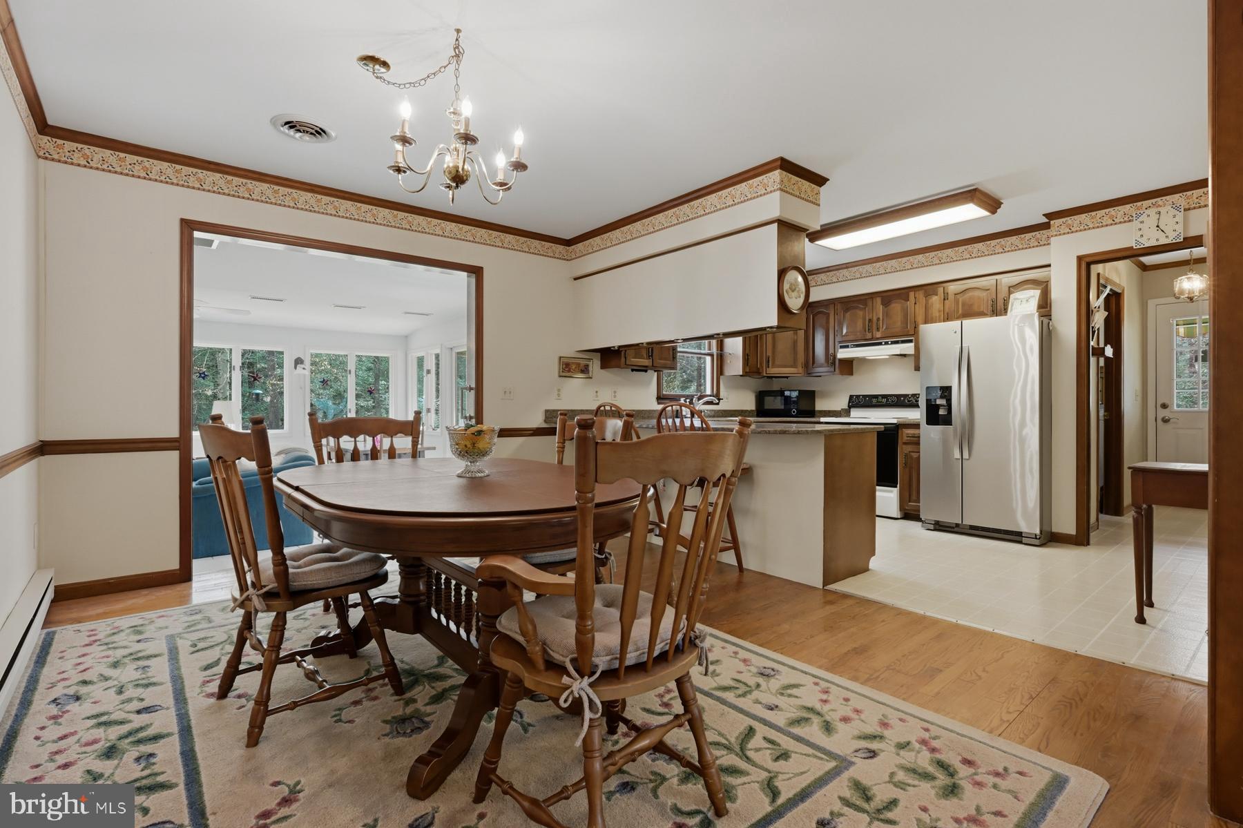 9829 Bantry Road Easton, MD 21601 - Photo 20 of 65 a view of a dining room with furniture