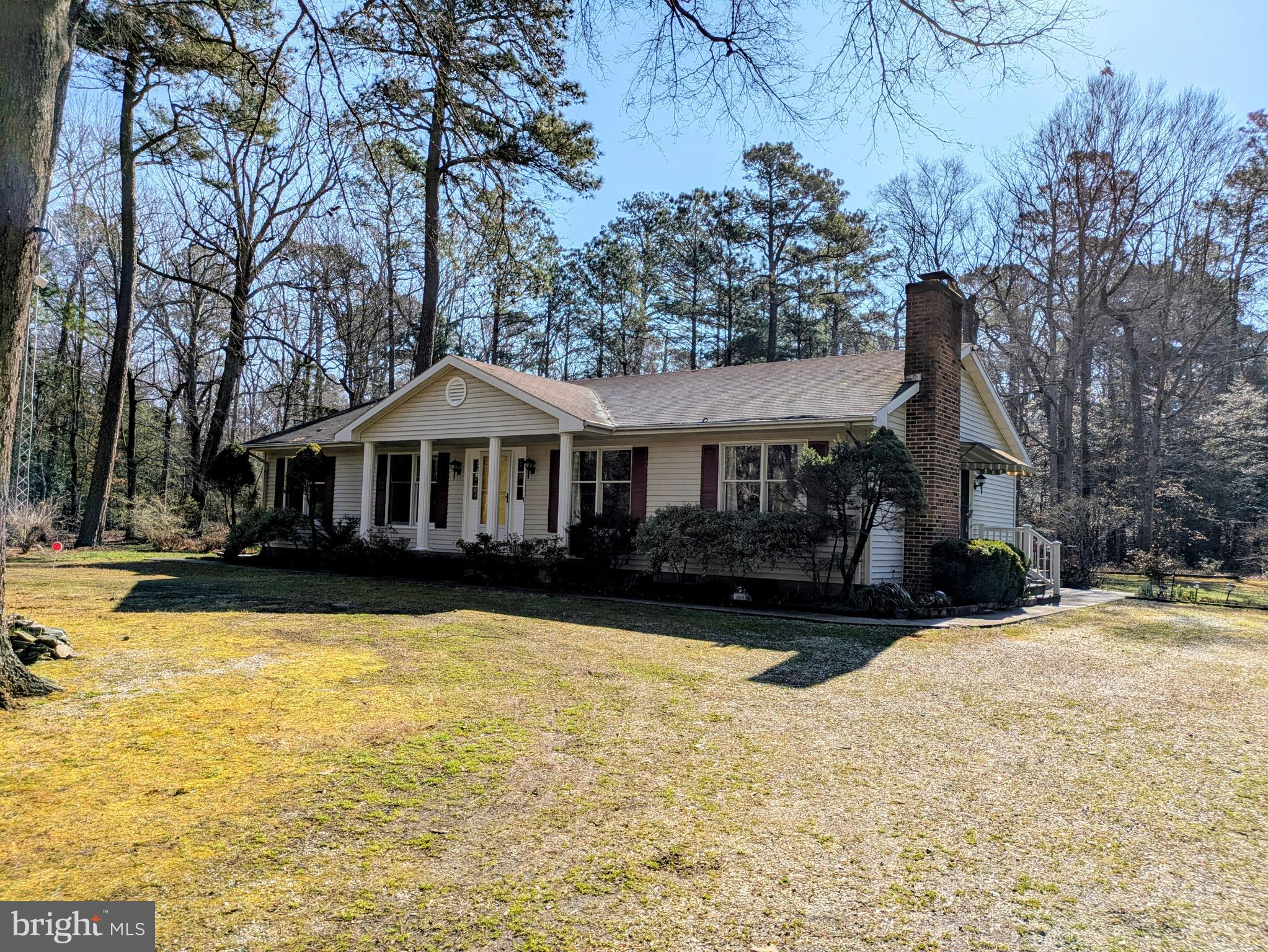 9829 Bantry Road Easton, MD 21601 - Photo 3 of 65 a front view of a house with yard yard and swimming pool