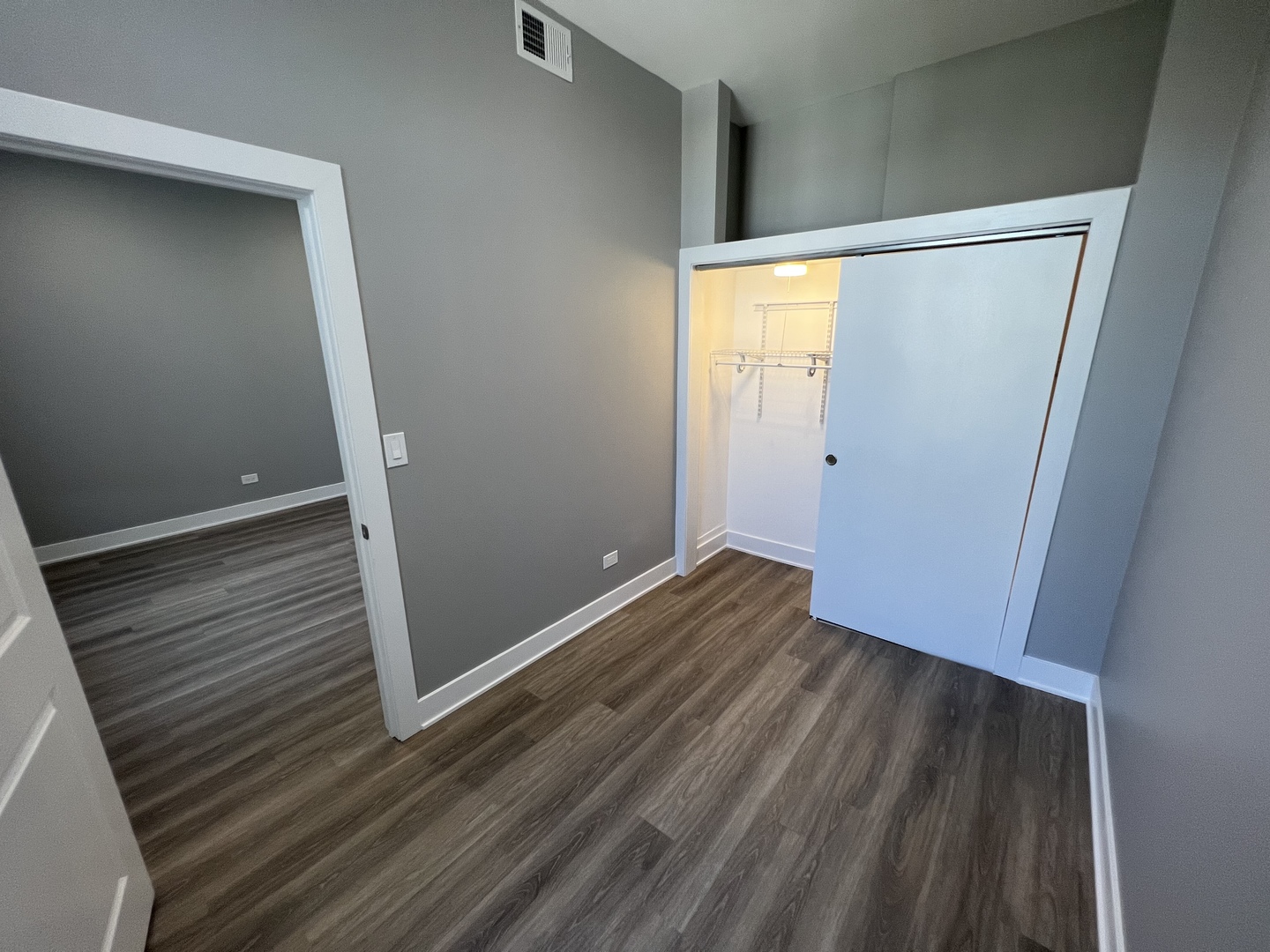 1227 West Ohio Street, Unit 3 Chicago, IL 60642 - Photo 14 of 18 a view of empty room with wooden floor