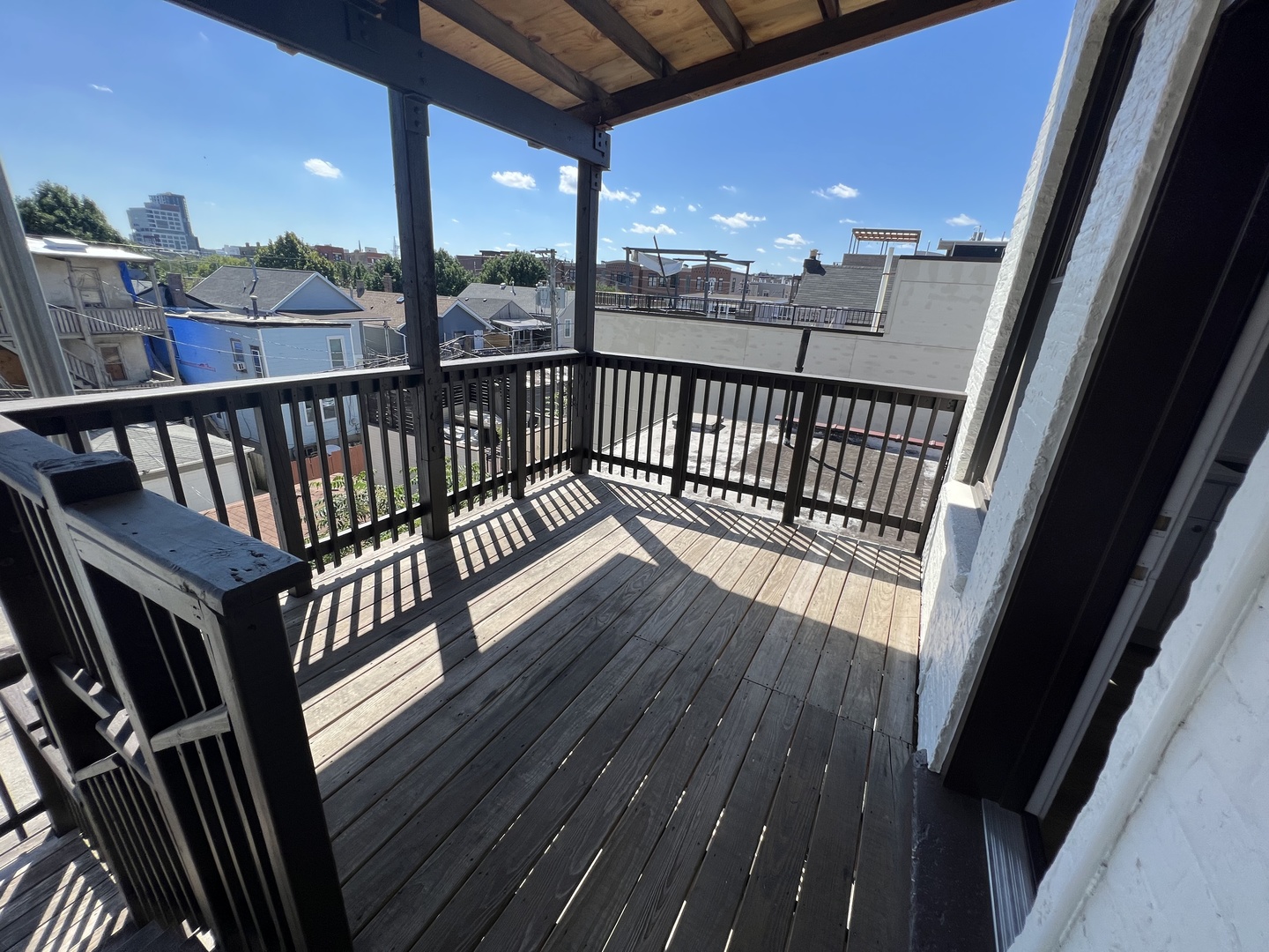 1227 West Ohio Street, Unit 3 Chicago, IL 60642 - Photo 8 of 18 a view of balcony with wooden floor
