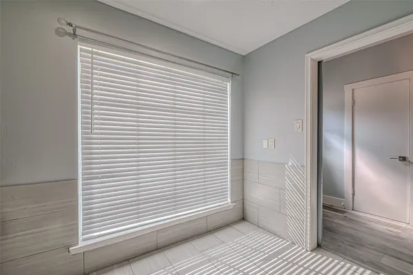 a view of a room that has a window in it