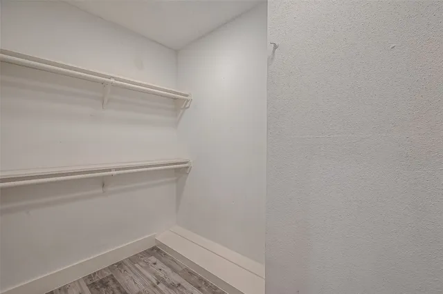 a view of an empty walk in closet