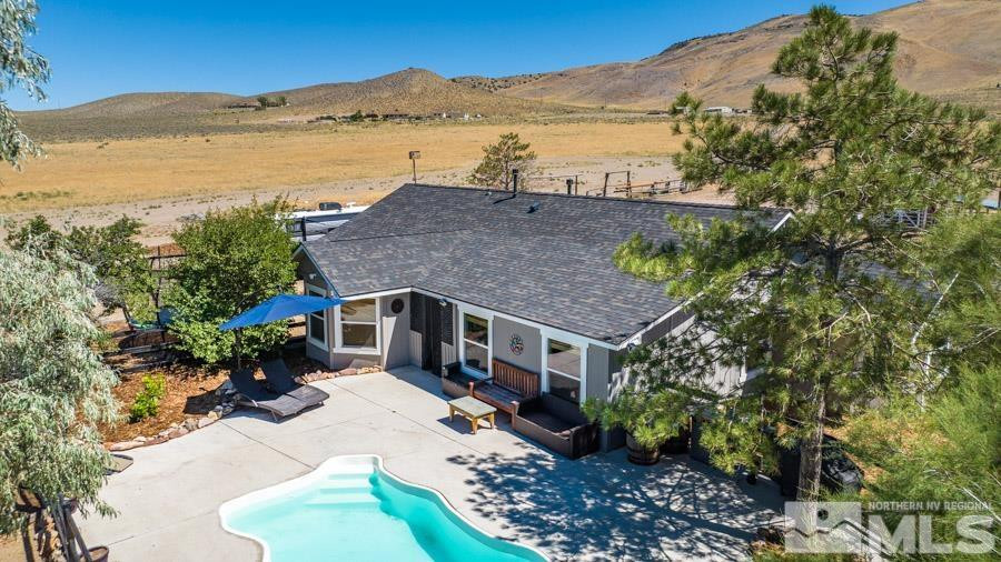 5940 Grass Valley Road Reno, NV 89510 - Photo 34 of 39 an aerial view of house with a garden