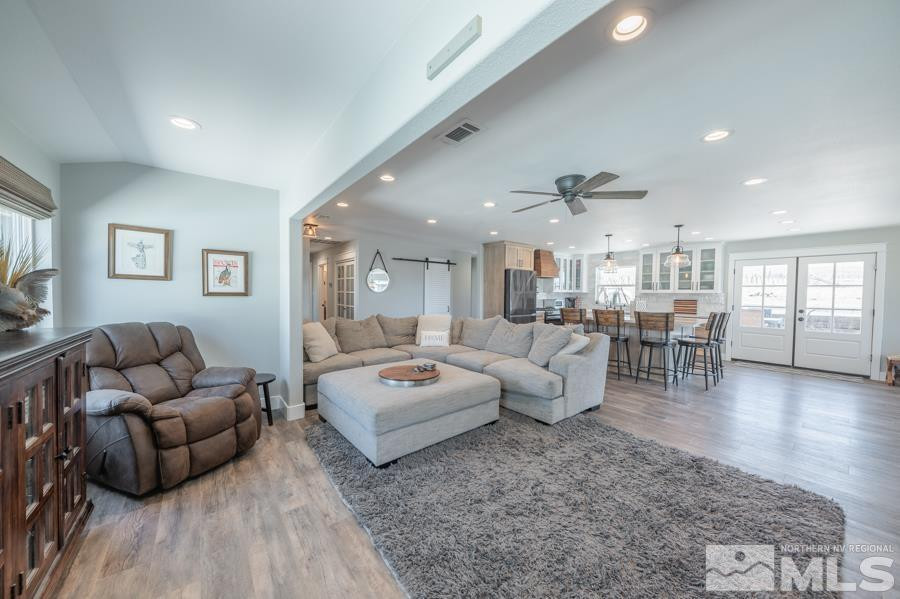 5940 Grass Valley Road Reno, NV 89510 - Photo 9 of 39 a living room with furniture and wooden floor