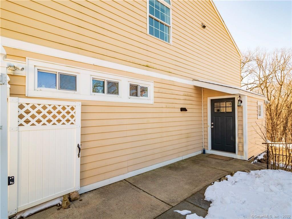 107 Black Rock Turnpike, Unit C Redding, CT 06896 - Photo 13 of 15 a view of a house with white door