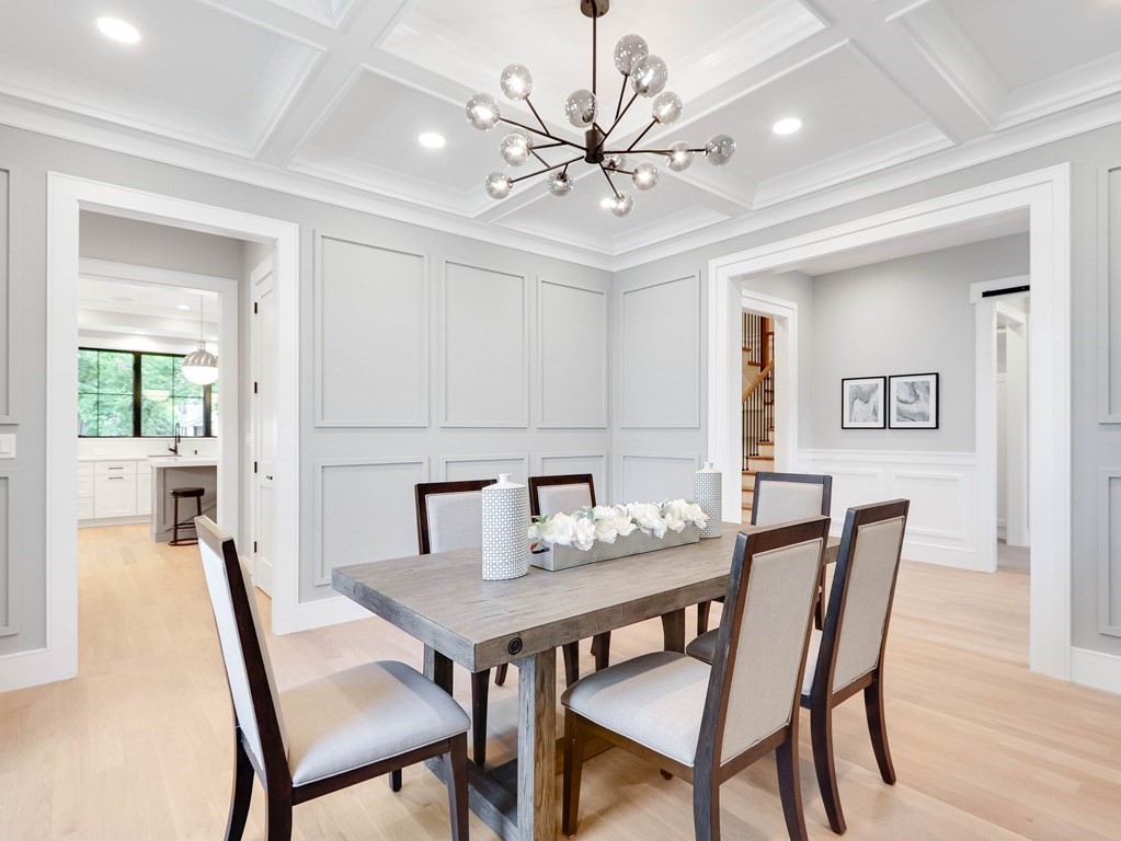 8 Manson Road Needham, MA 02494 - Photo 14 of 36 a view of a dining room with furniture and wooden floor