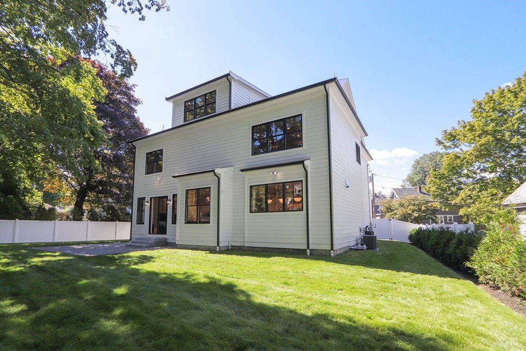 8 Manson Road Needham, MA 02494 - Photo 2 of 36 a view of an house with backyard and trees