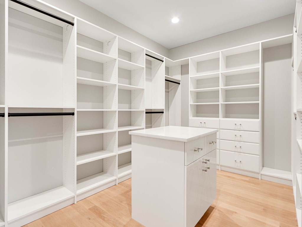 8 Manson Road Needham, MA 02494 - Photo 23 of 36 a kitchen with a stove and a cabinet
