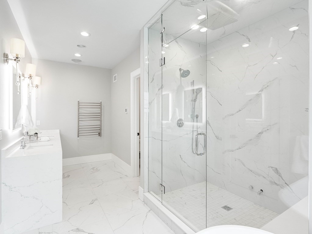 8 Manson Road Needham, MA 02494 - Photo 28 of 36 a bathroom with a shower and a glass door