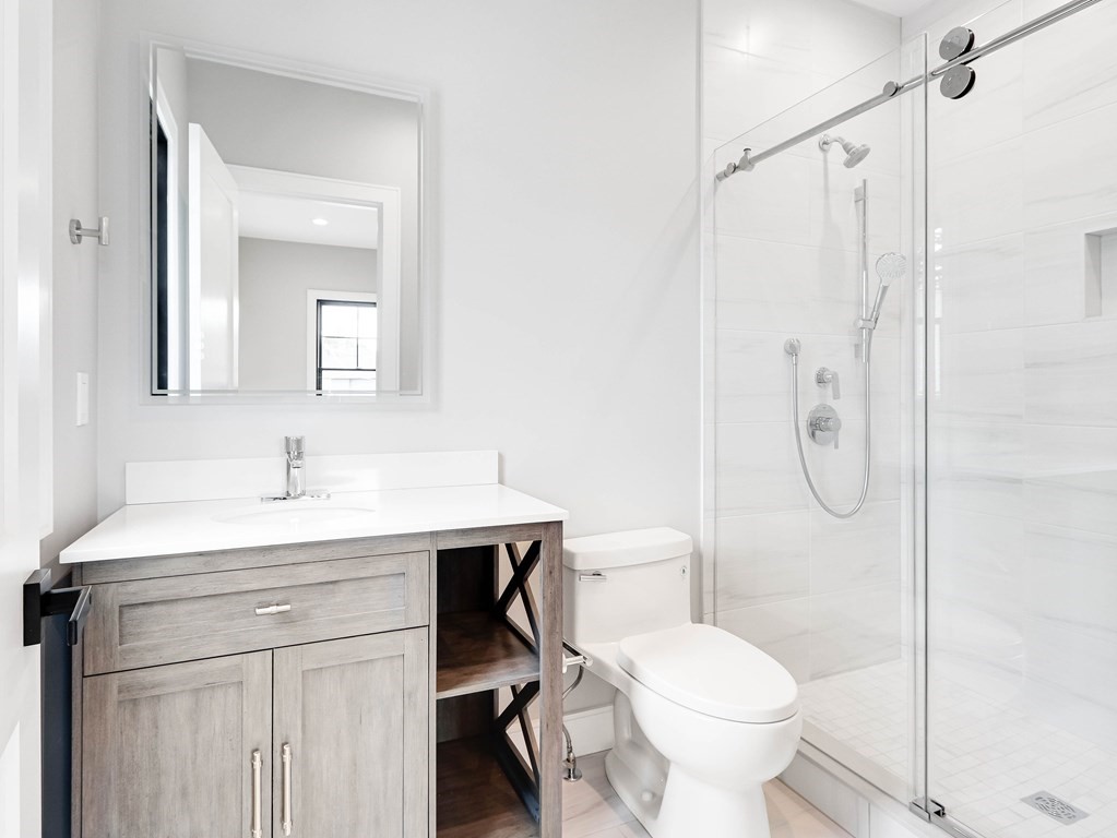 8 Manson Road Needham, MA 02494 - Photo 29 of 36 a bathroom with a sink toilet and shower