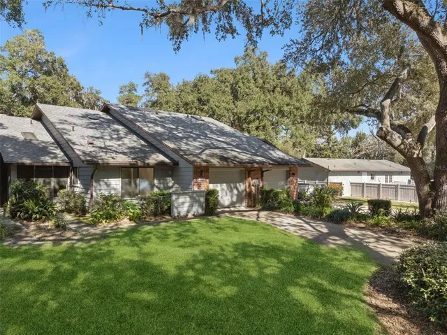 a view of a house with a big yard