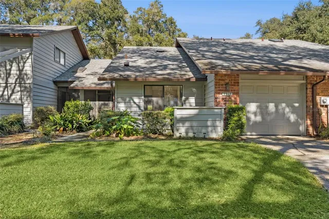 a view of a house with a garden