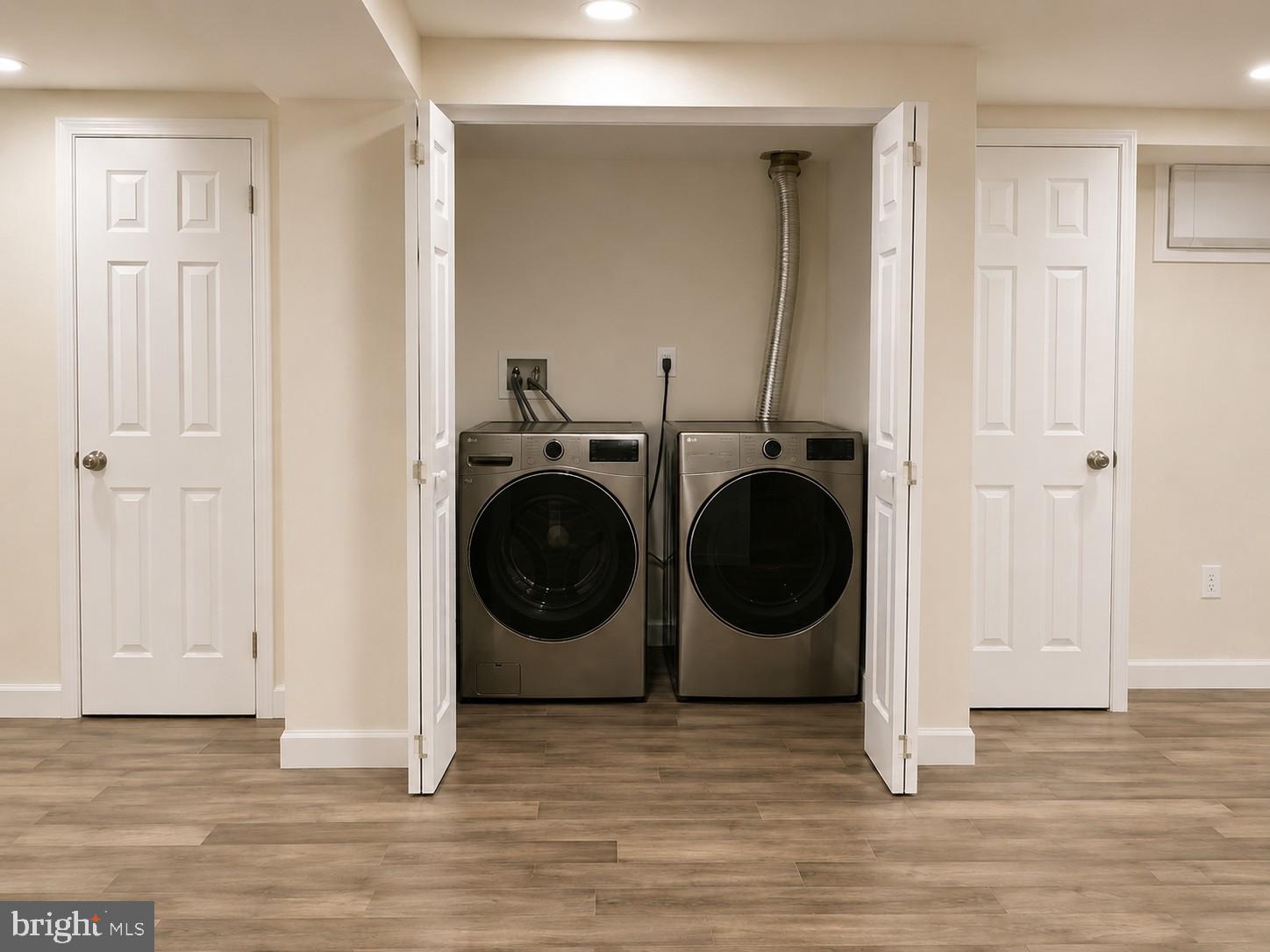 12658 Scaggsville Road Highland, MD 20777 - Photo 11 of 13 a view of a storage & utility room with wooden floor