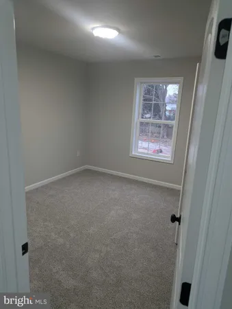 an empty room with an entryway