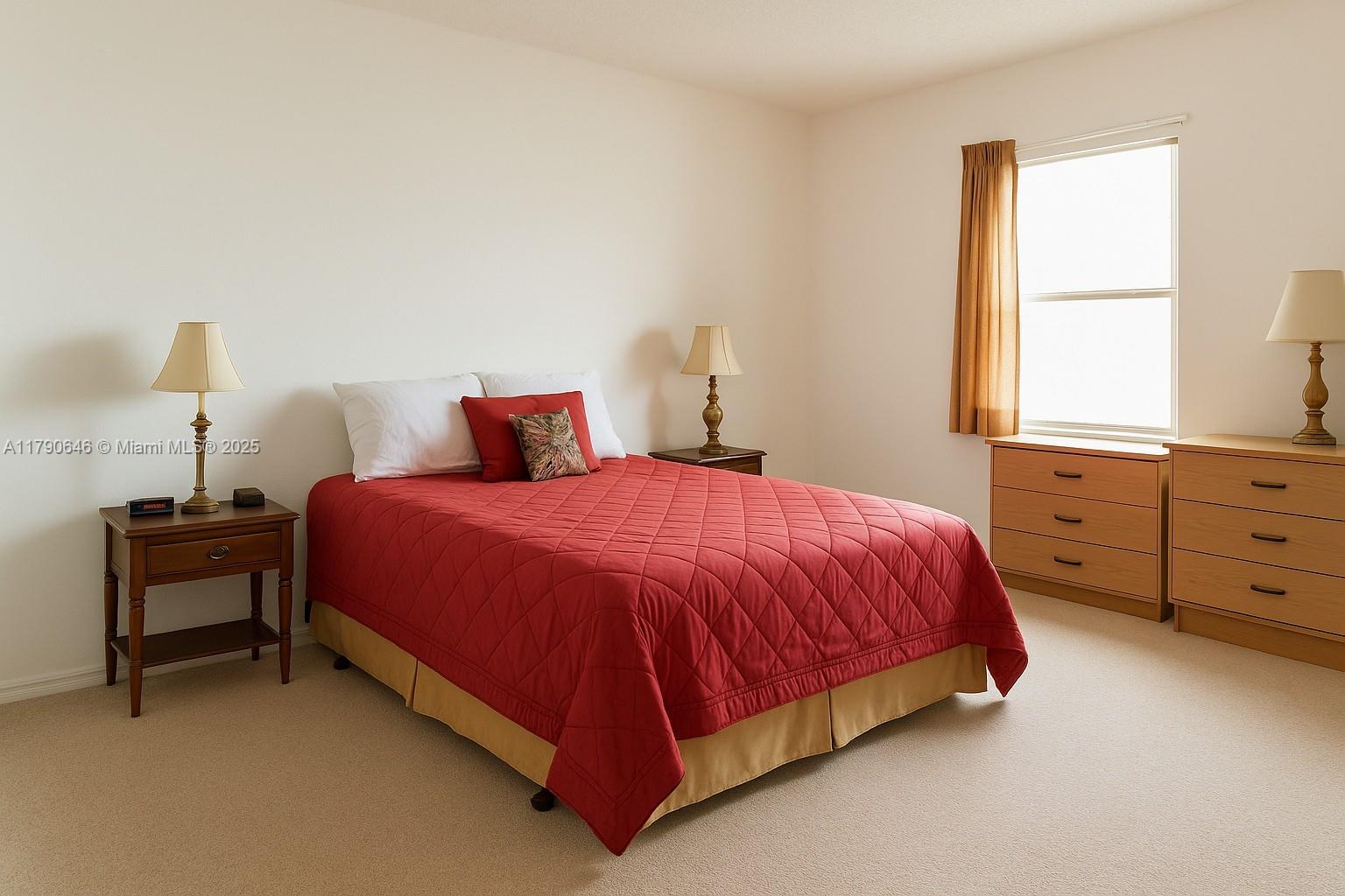 4881 Northwest 22nd Street, Unit B7 Lauderhill, FL 33313 - Photo 6 of 13 a spacious bedroom with a bed and a window