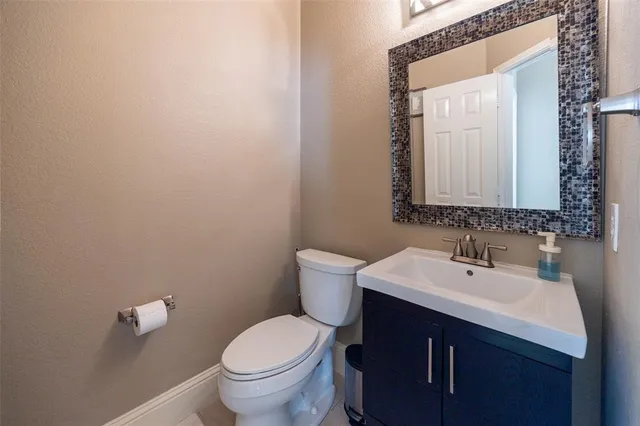 a bathroom with a sink and a toilet