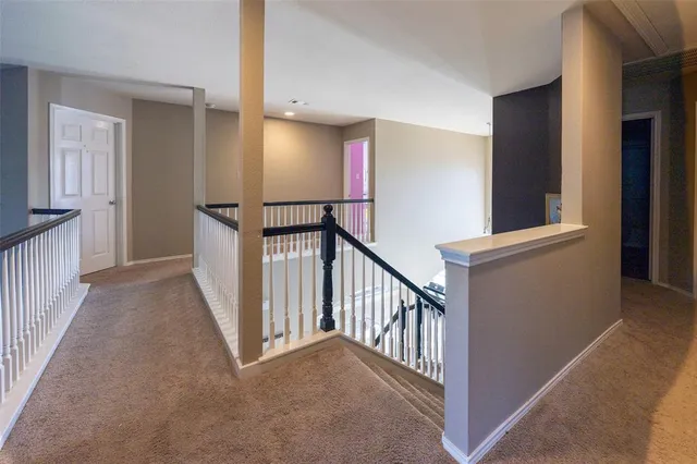 a view of a hallway with entryway